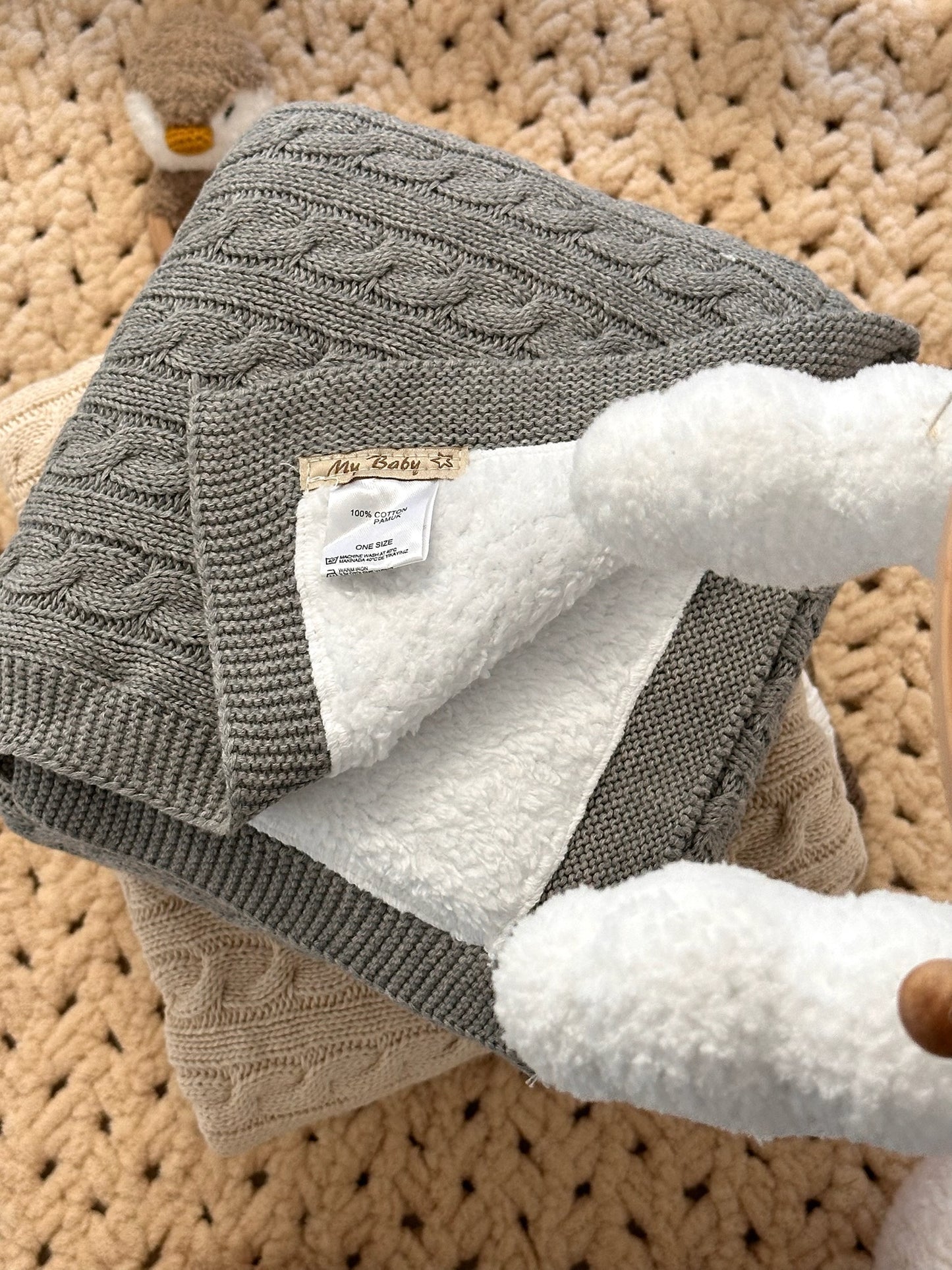 Strickdecke mit Teddyplüsch