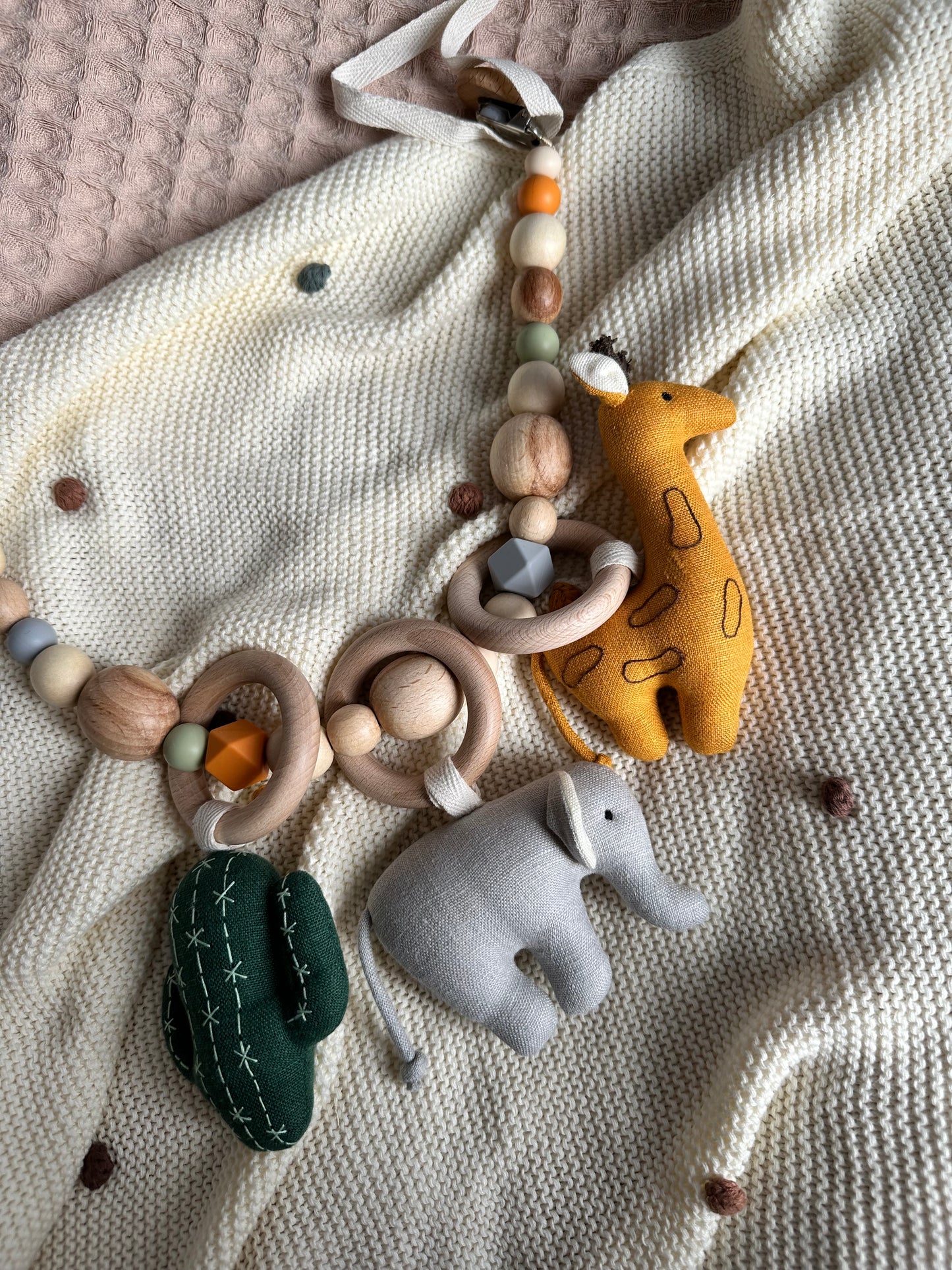 Kinderwagenkette mit Tieren aus Leine